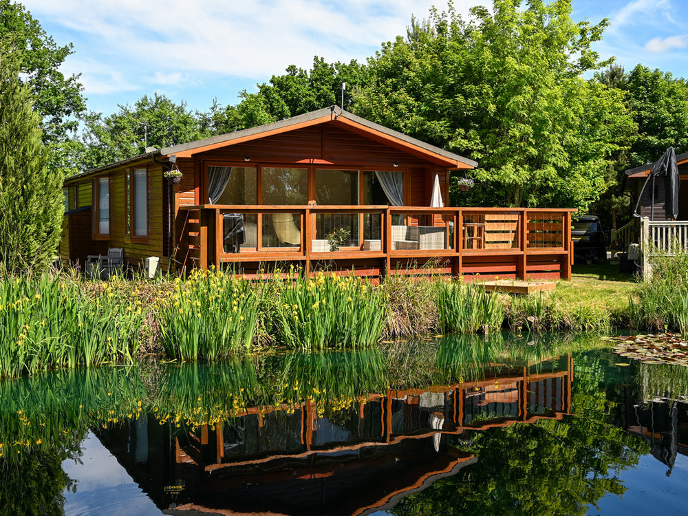 Lodge beside the lake at Vale of York Country Park