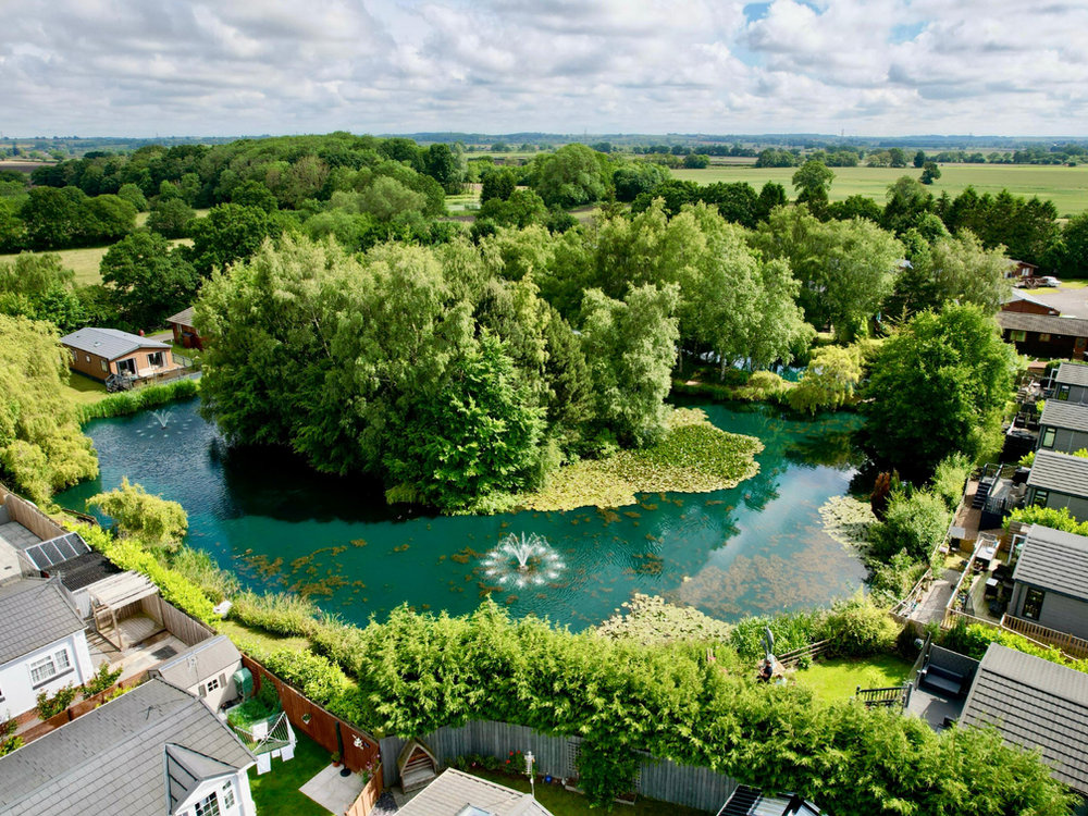 Aerial view of the fishing lake at Vale of York Country Park