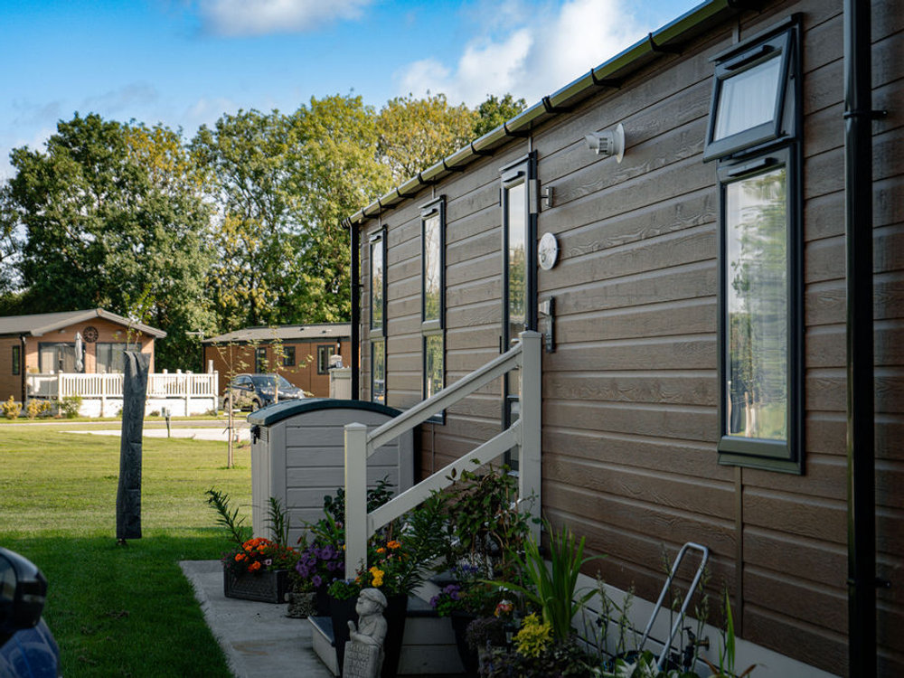Lodge exterior and decking at Wild Rose Country Park